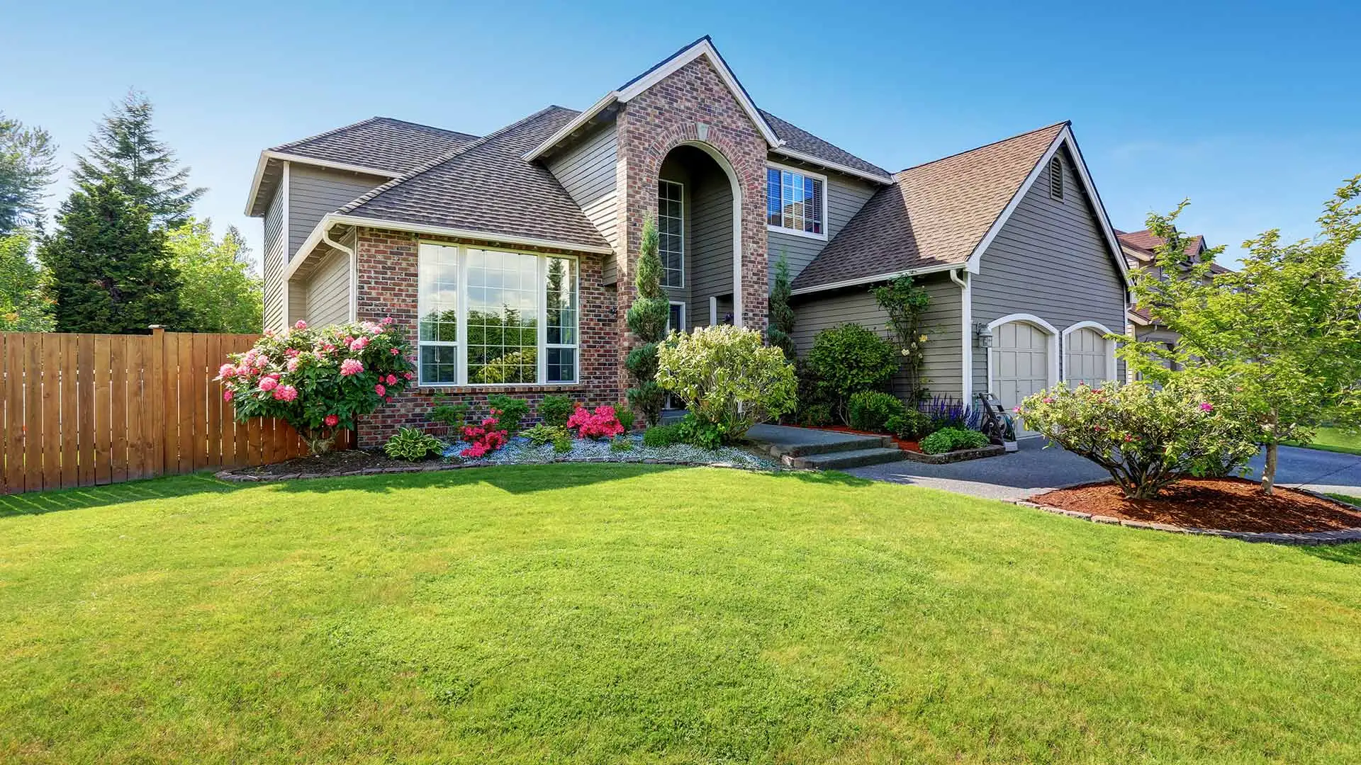 Home with healthy landscape near La Vista, NE.