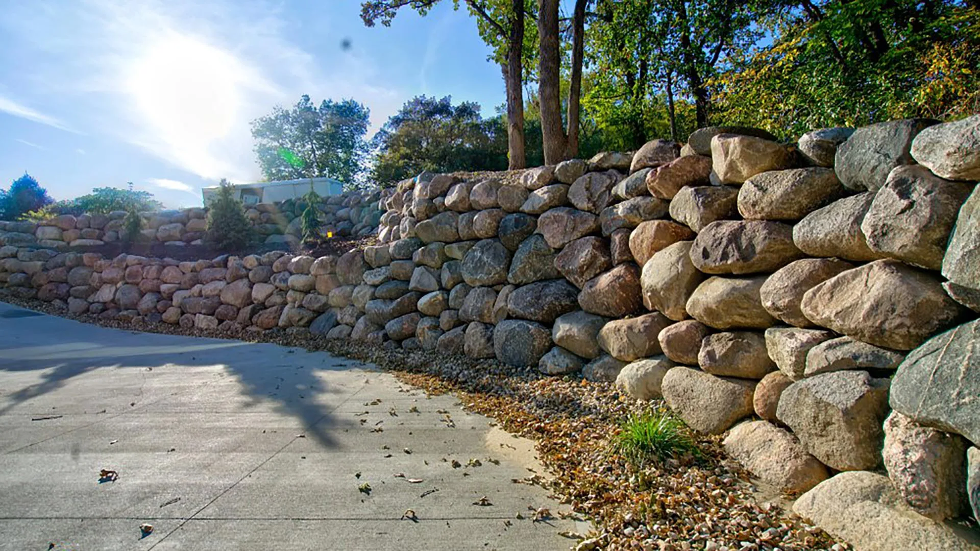 A retaining wall built with natural rocks in Omaha, NE.