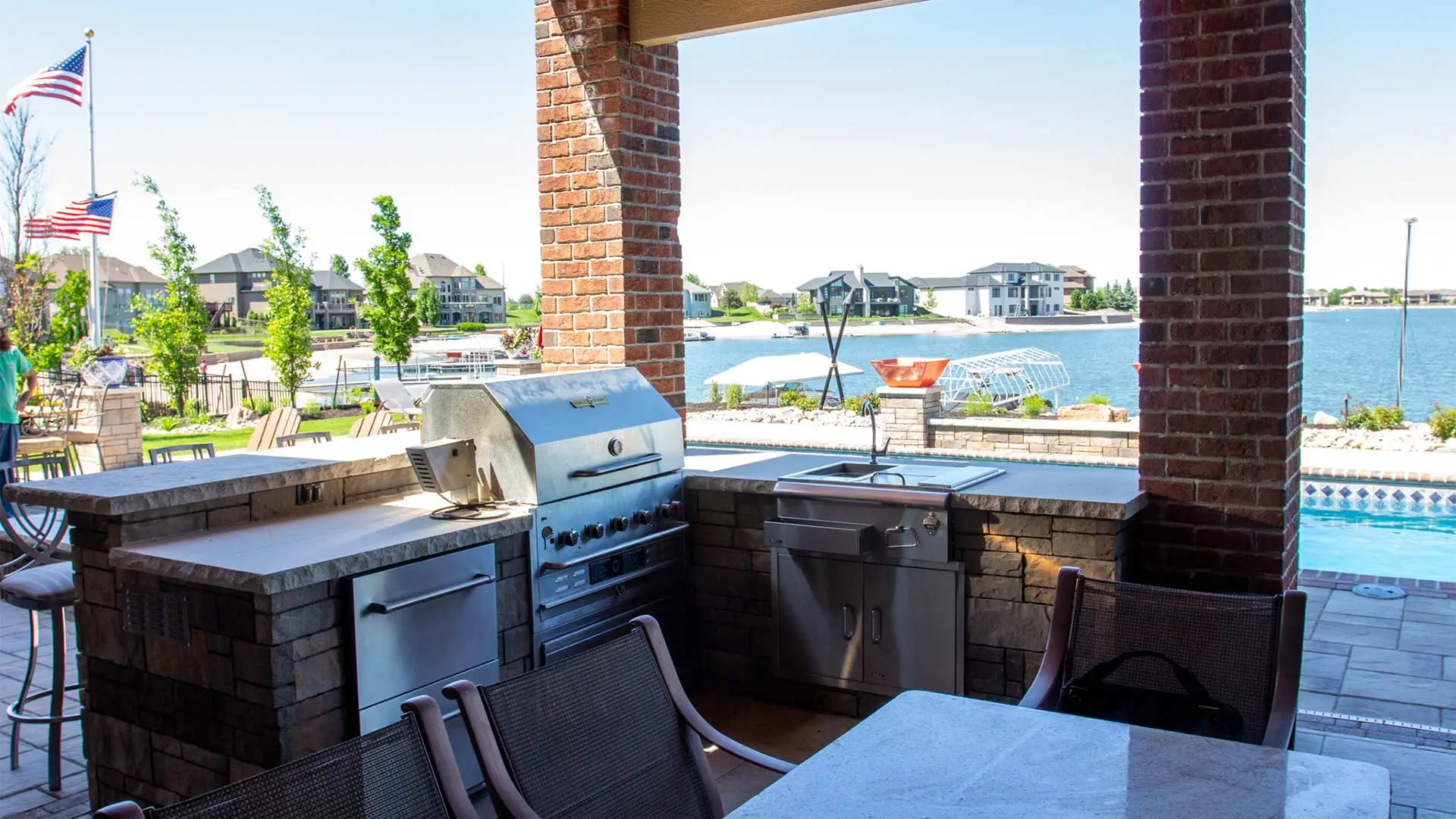 Outdoor kitchen with custom patio and grill feature in Gretna, NE.