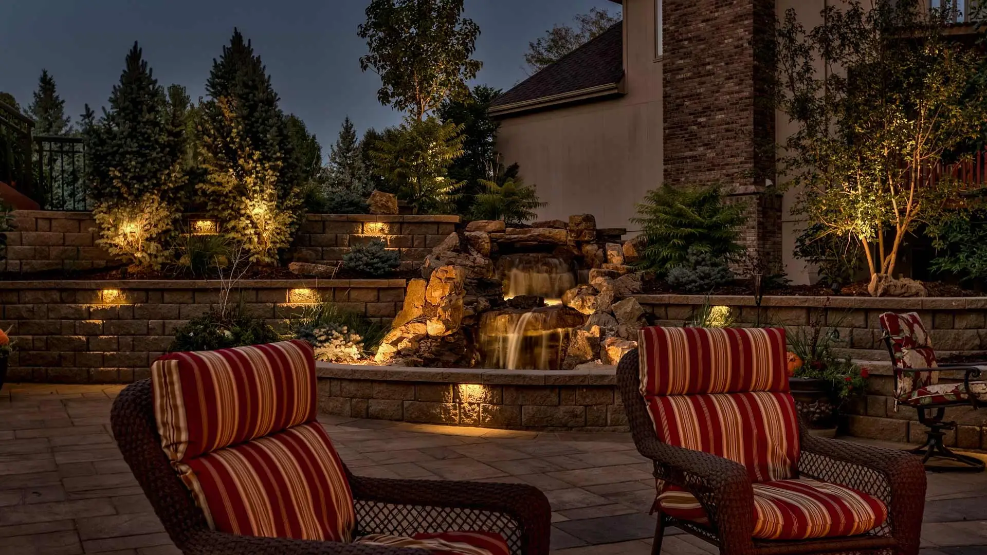 Outdoor lighting installed around a high-end patio space in Bennington, NE.