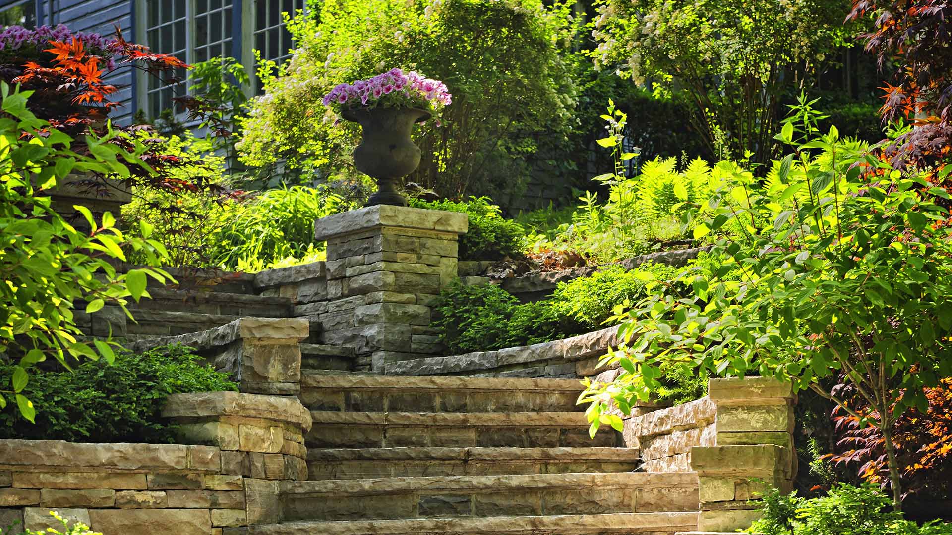Outdoor steps made out of stone and surrounded by plants near Omaha, NE. 