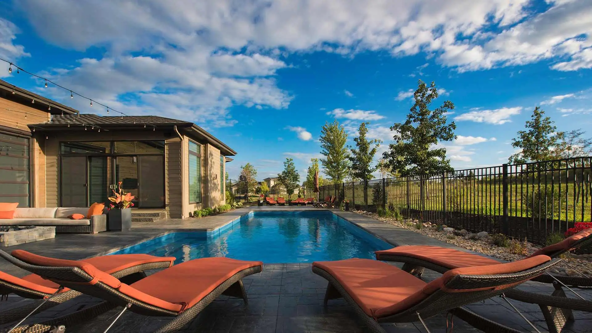 Custom swimming pool and patio installed in Omaha, Nebraska.