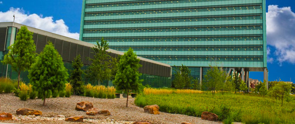 A commercial building with regular landscape maintenance in Omaha, NE.