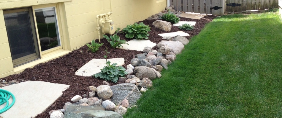 Landscape bed cleaned up from spring cleanup in Yutan, NE.