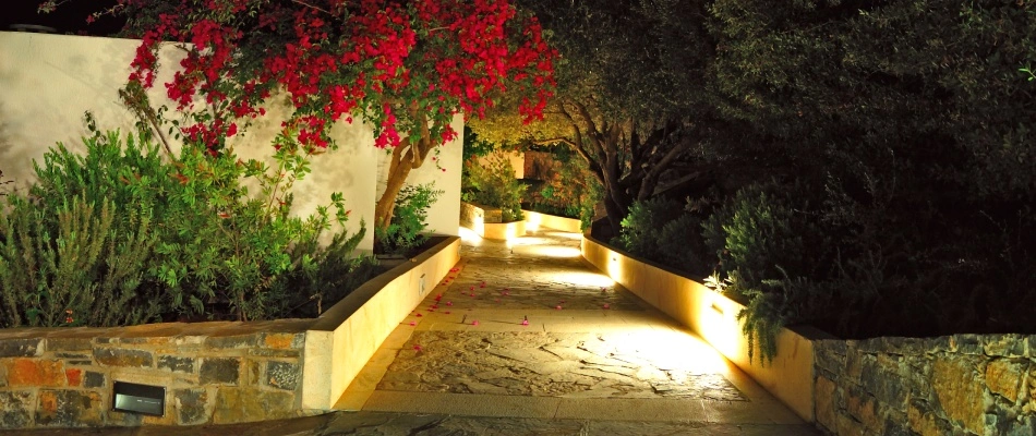 Grazing lighting technique installed for a walkway in Bennington, NE.