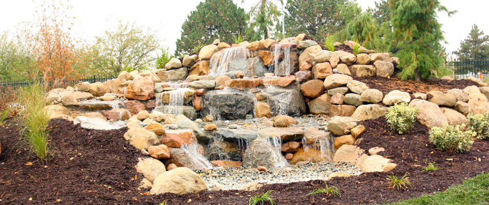 Large waterfall feature made from boulders near Omaha, NE.
