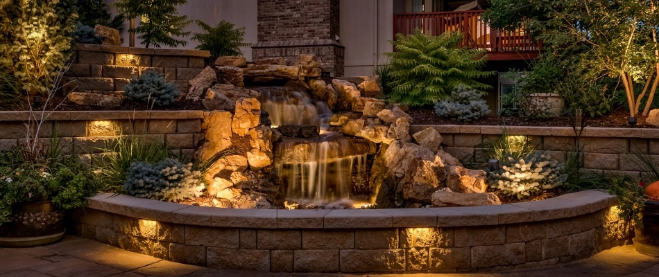 Led lighting installed for a hardscape water feature in Omaha, NE.