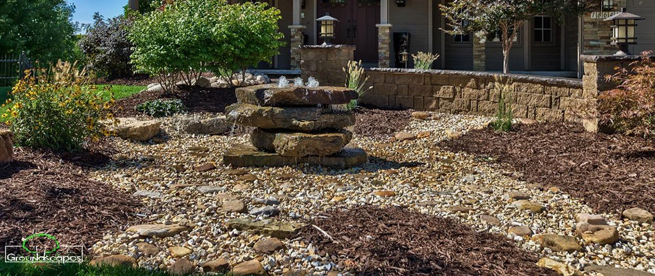 Rock and mulch bed with bubbling water feature near Bennington, NE.