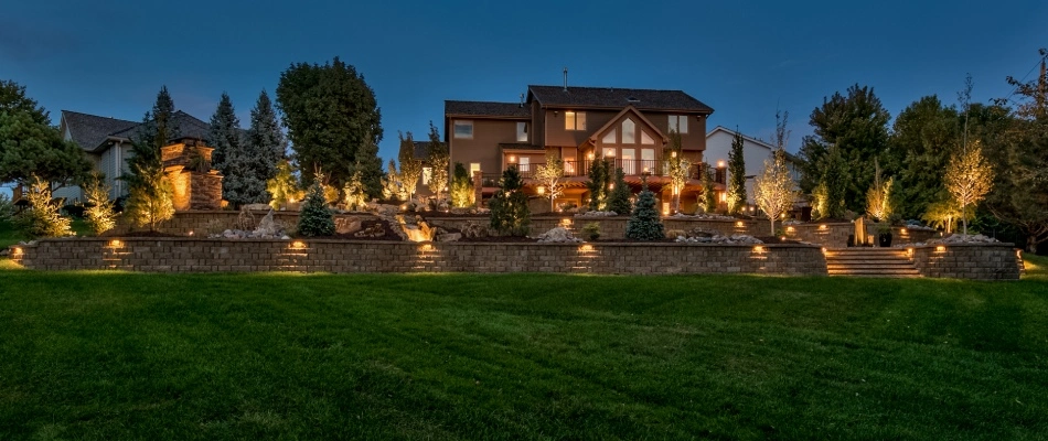 Wall washing lighting technique installed beside retaining walls in Omaha, NE.